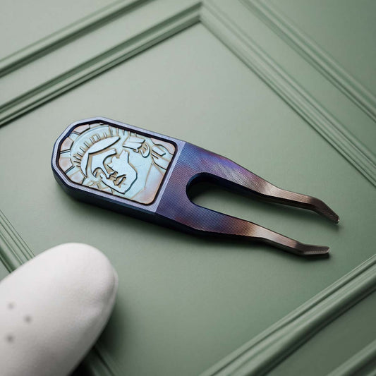 Kraken Golf Torchbearer carbon steel pitch tool, hand-torched blue and pink finish with copper patina Liberty face inlay