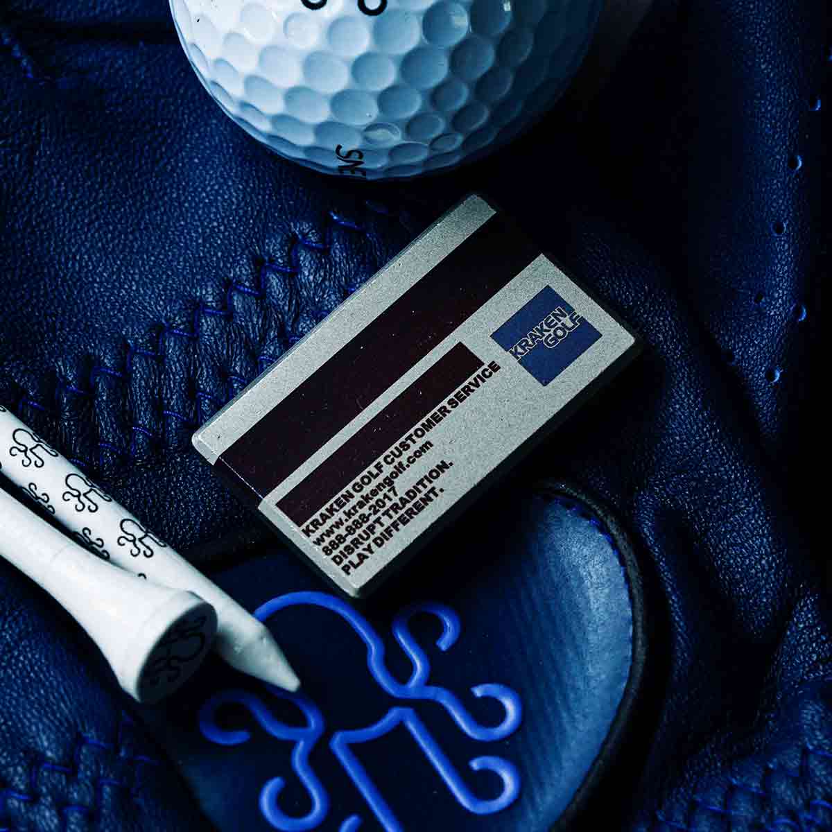 back side of the Black Card golf ball marker from Kraken Golf