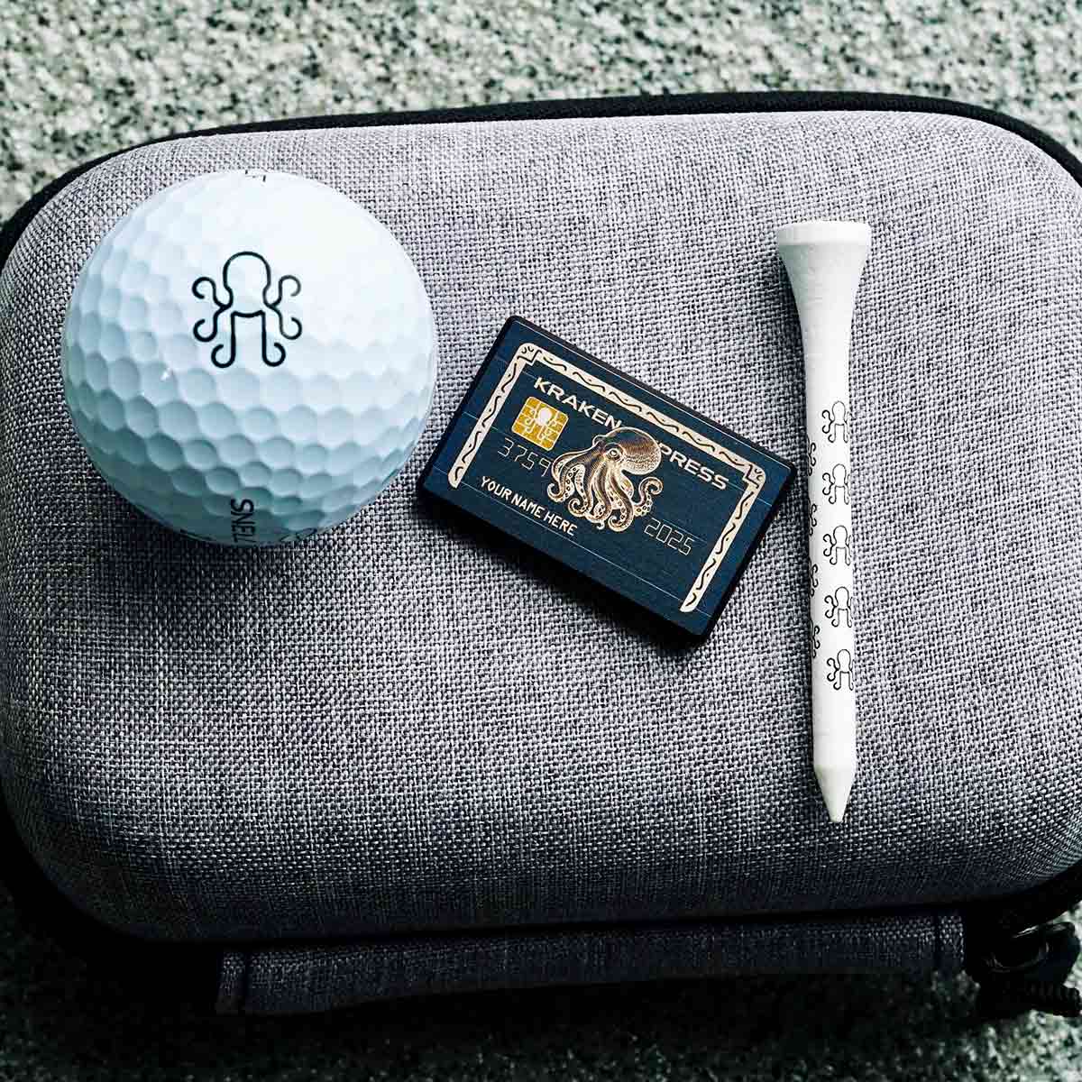 CNC-milled titanium Kraken Black Card ball marker for golfers