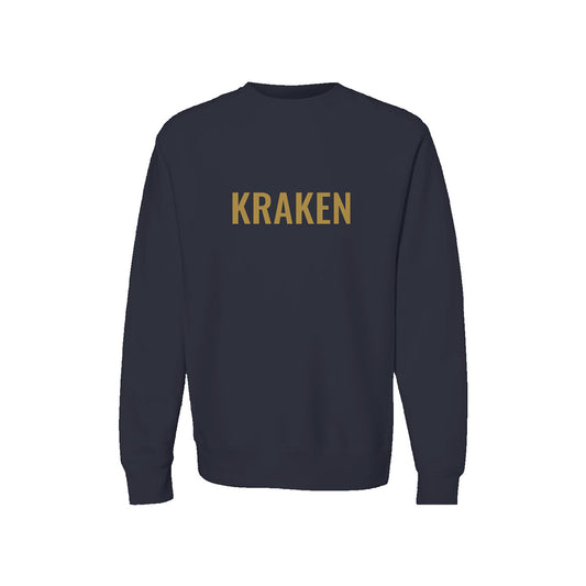 Brass KRAKEN wordmark printed across the chest of a navy heavyweight crewneck sweatshirt