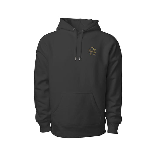 Brass Kraken logo embroidered on the chest of a black heavyweight hoodie