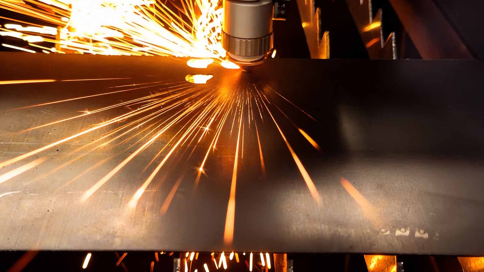 Metal cutting process with sparks flying