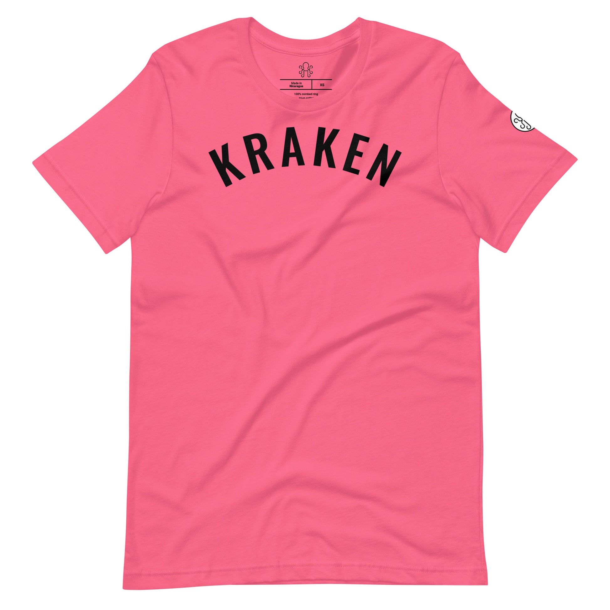 Hot pink Kraken Golf t-shirt with bold black "KRAKEN" lettering across the chest and a small Kraken logo on the left sleeve, set against a circular white background.