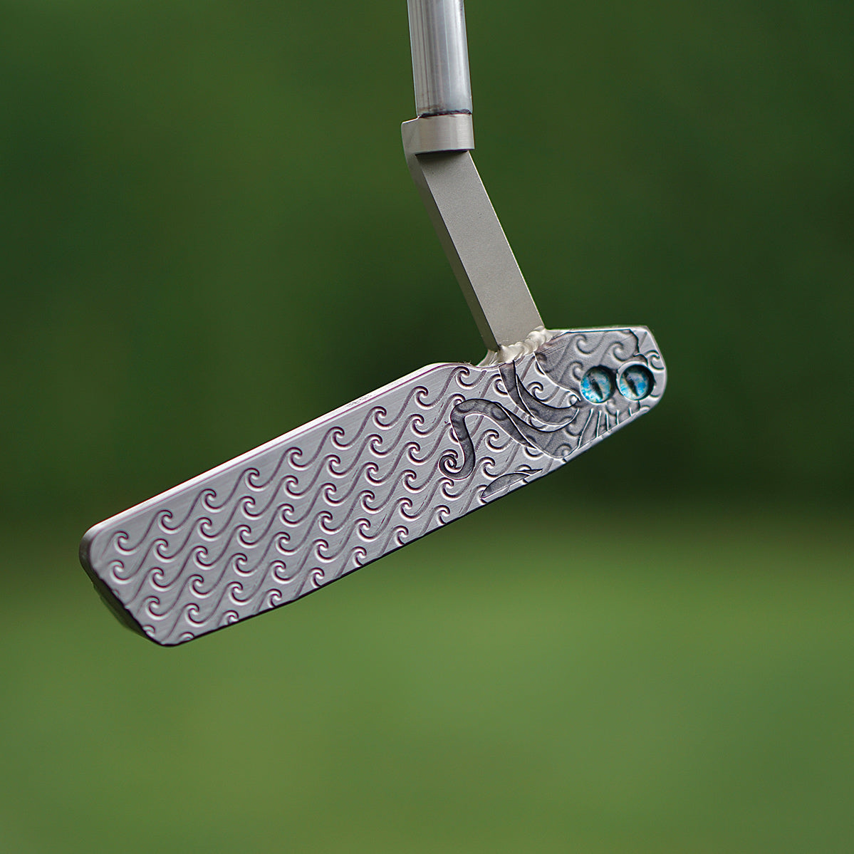 3.0 Bourne Putter - Carbon Steel Glass Eyes on face