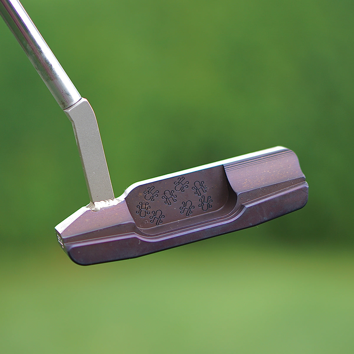 3.0 Bourne Putter - Carbon Steel Glass Eyes on face